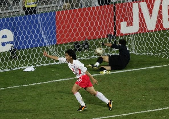 Jung-Hwan-Ahn-of-South-Korea-heads-the-winning-goal-past-goalkeeper-Gianluigi-Buffon-of-Italy-838976-1350645169